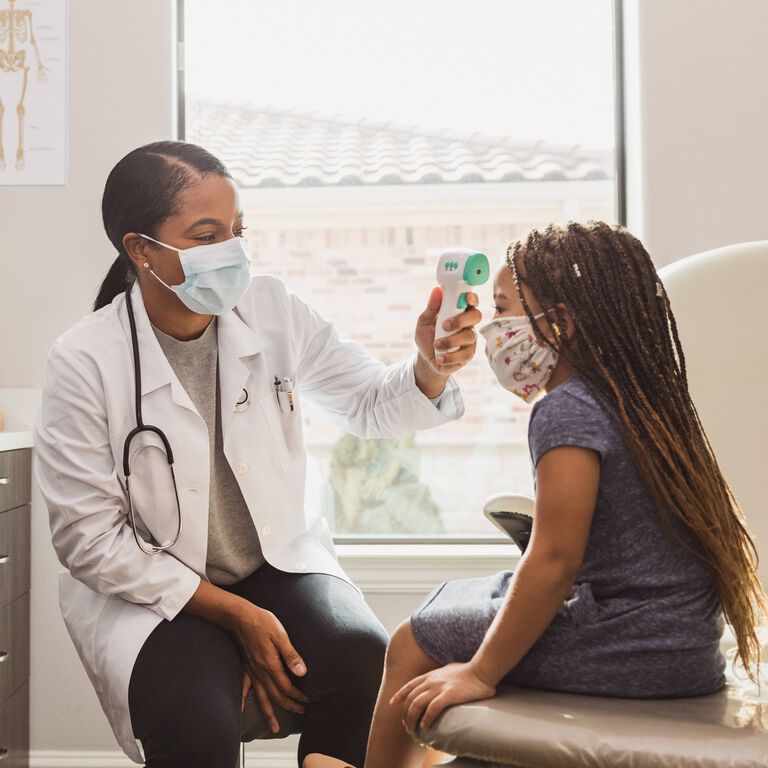 female doctor with a little girl female doctor with a little girl